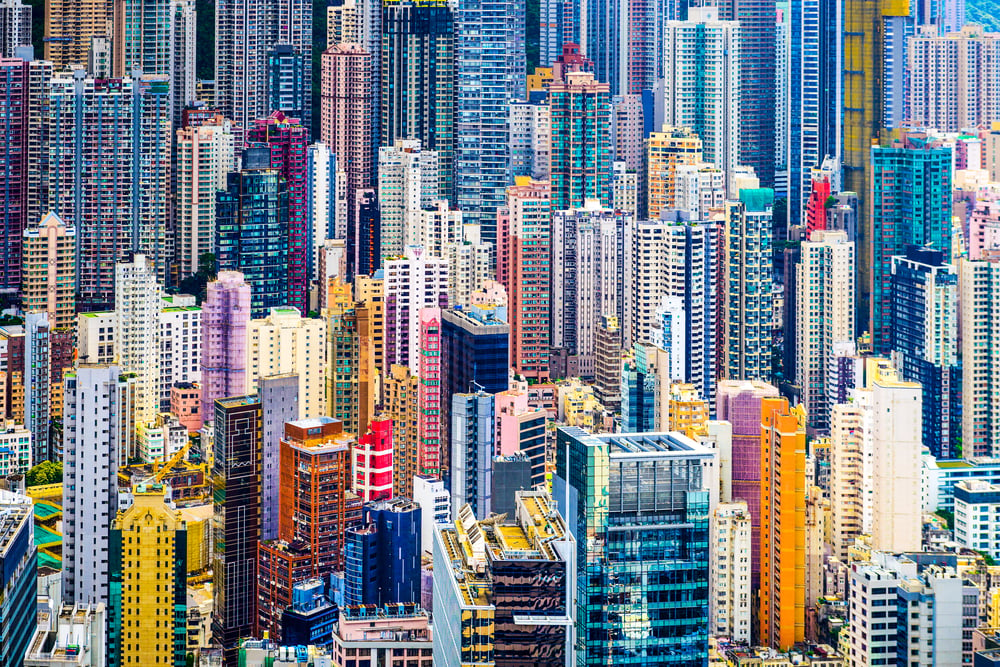 Hong Kong, China dense cityscape of office buildings.-1
